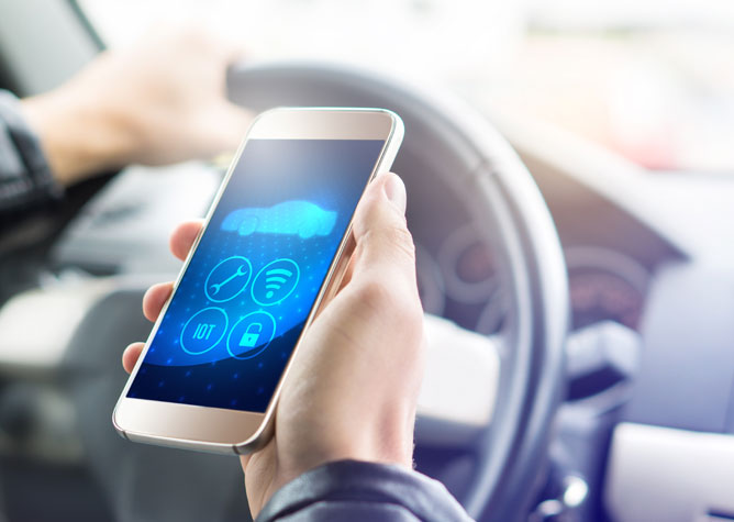 looking at phone in the car