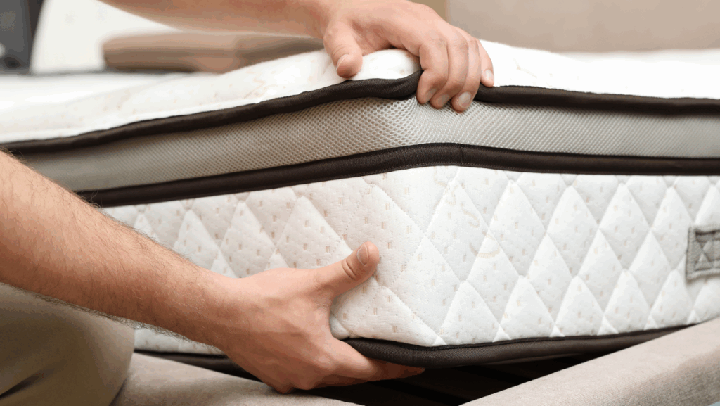 Person choosing bed from Mattress Retailer